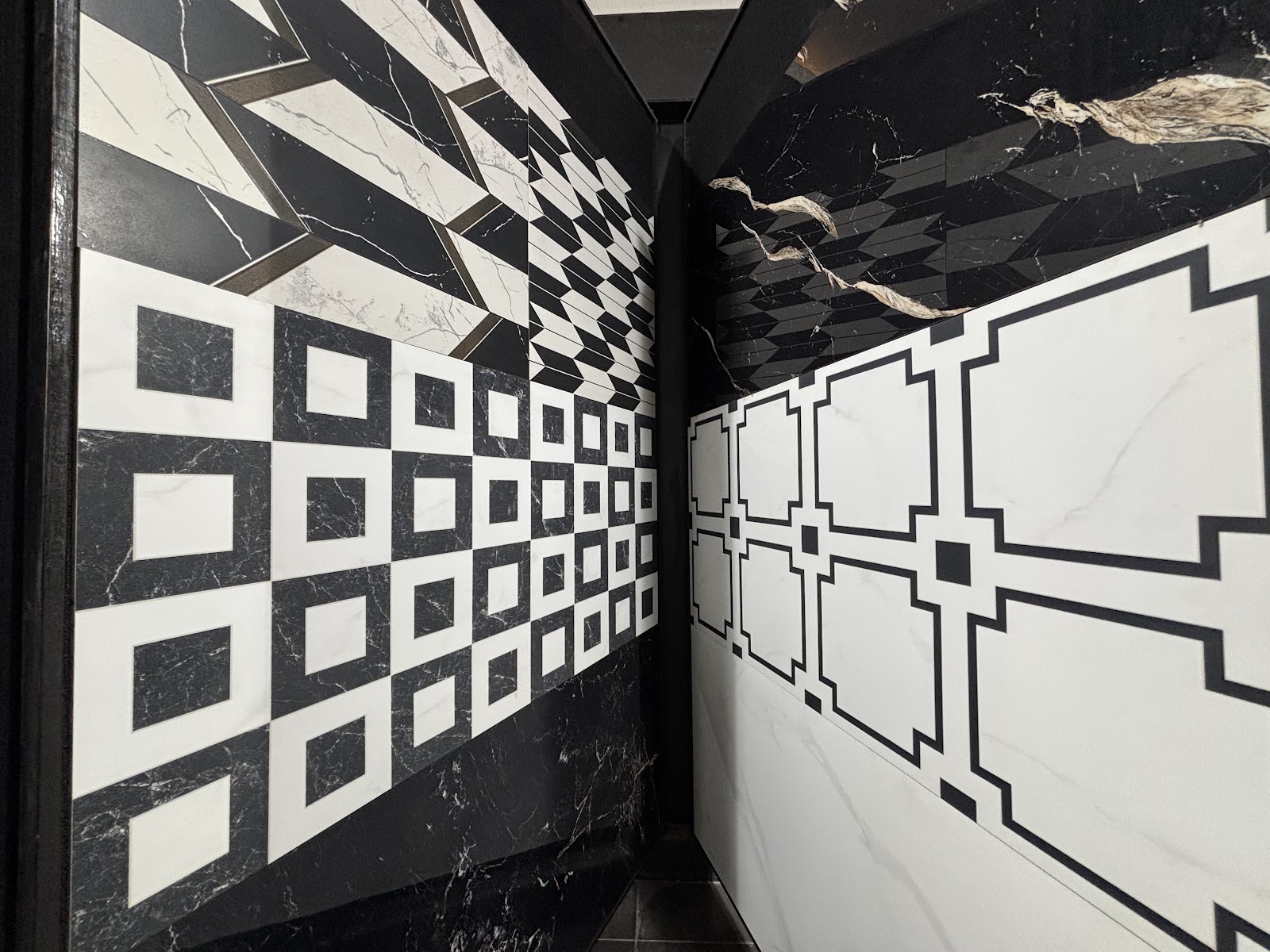 Black and white geometric surface display at the World of Tile showroom in Sector 9 Noida