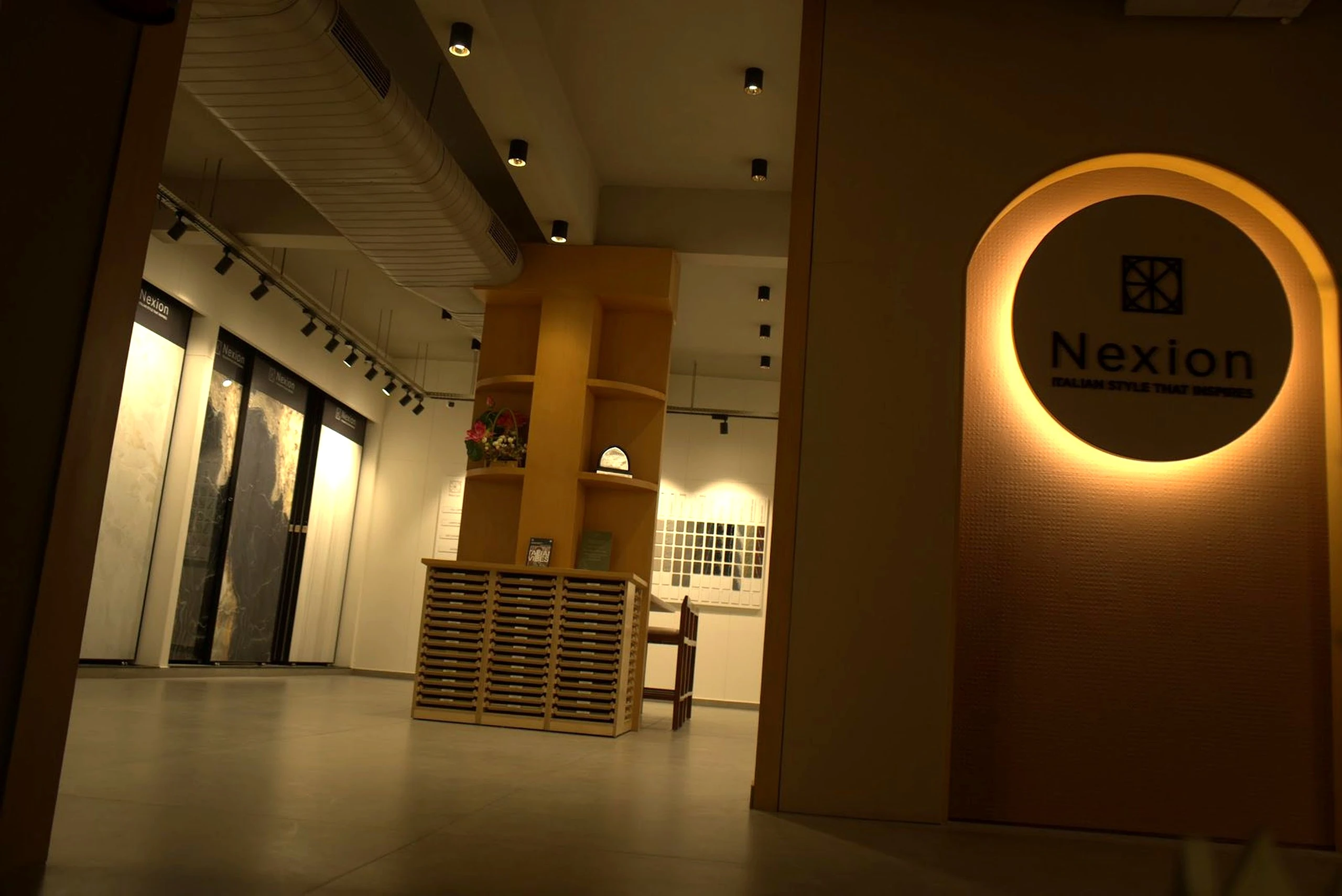 Main display corridor at the World of Tile showroom in Noida