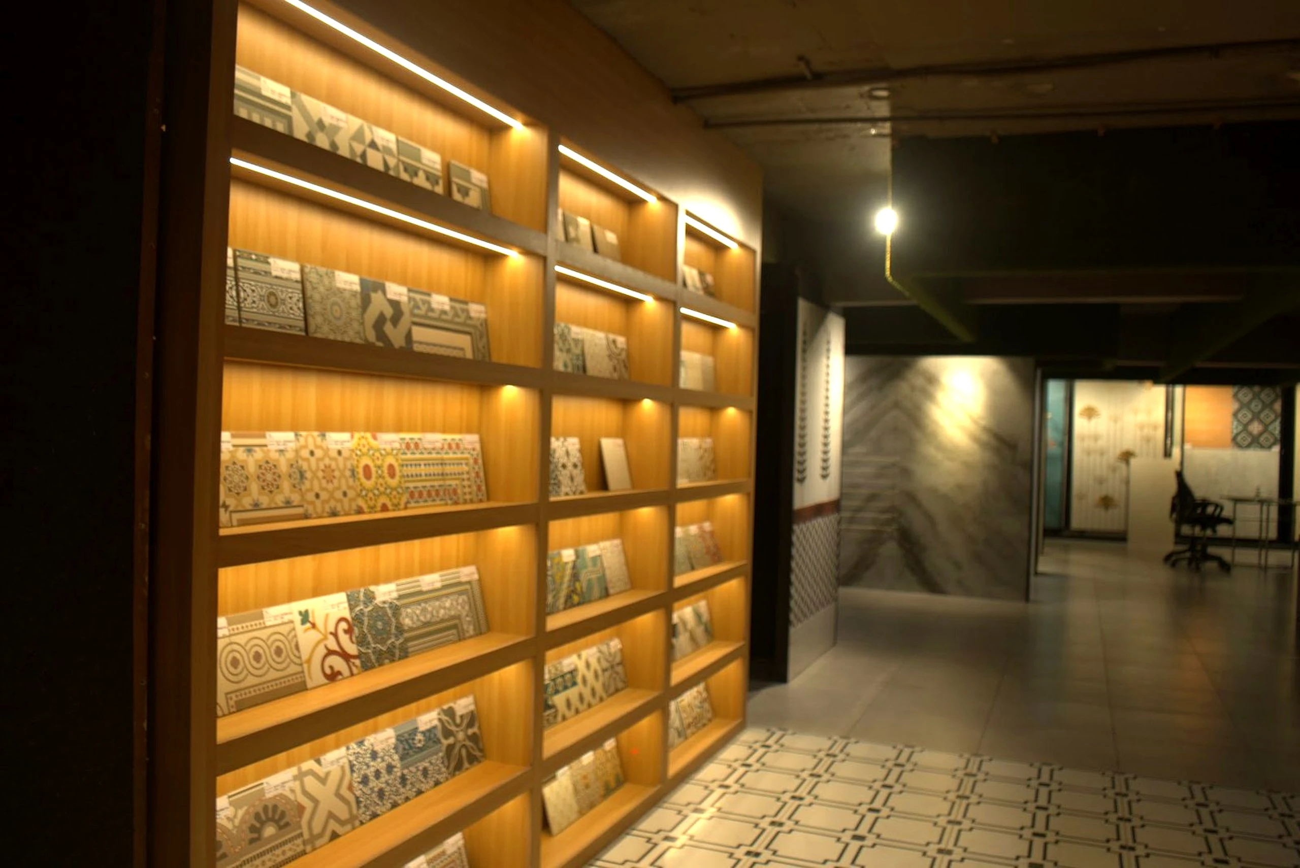 Ceramic, vitrified and porcelain tile samples displayed side by side on the racks at World of Tile showroom in Sector 9 Noida