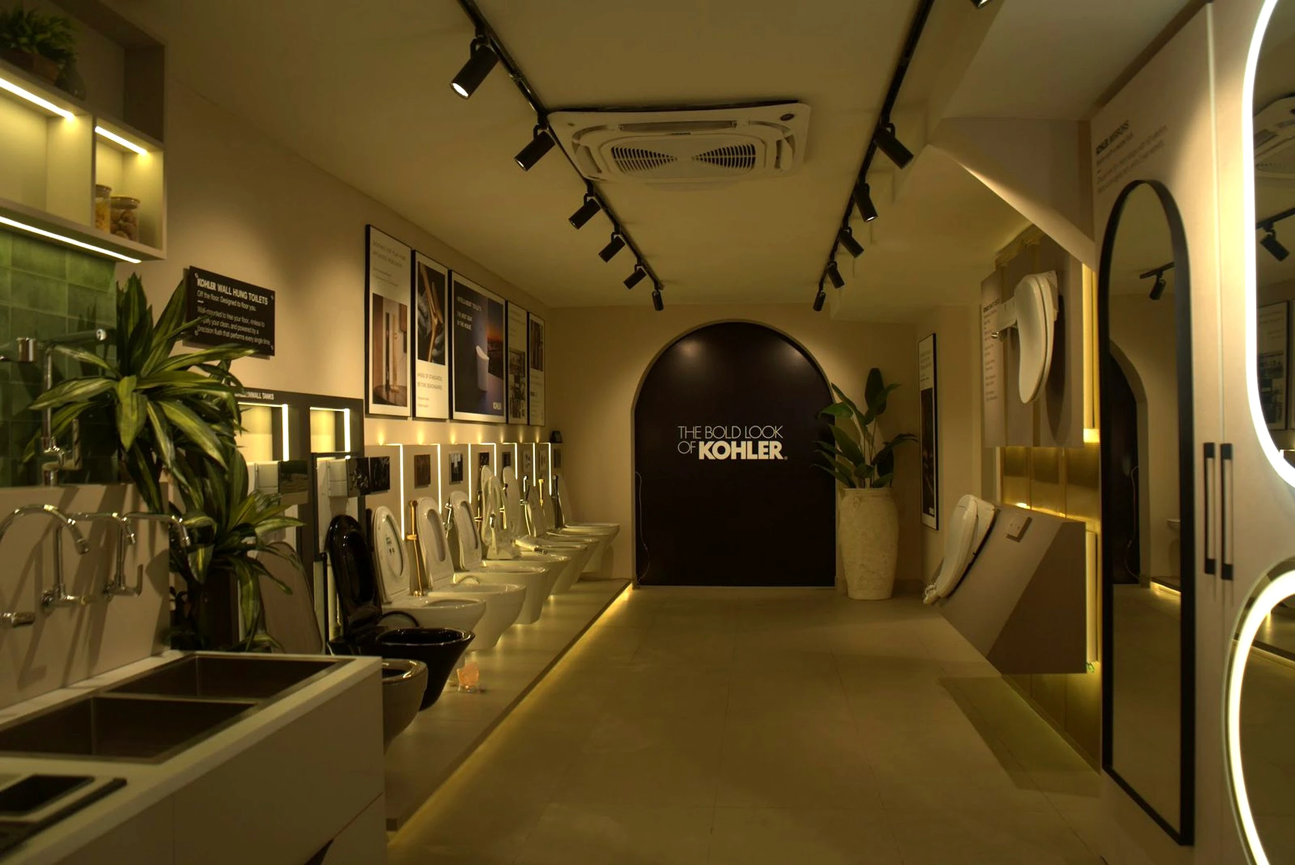 Vanity setting with backlit mirror and stone counter