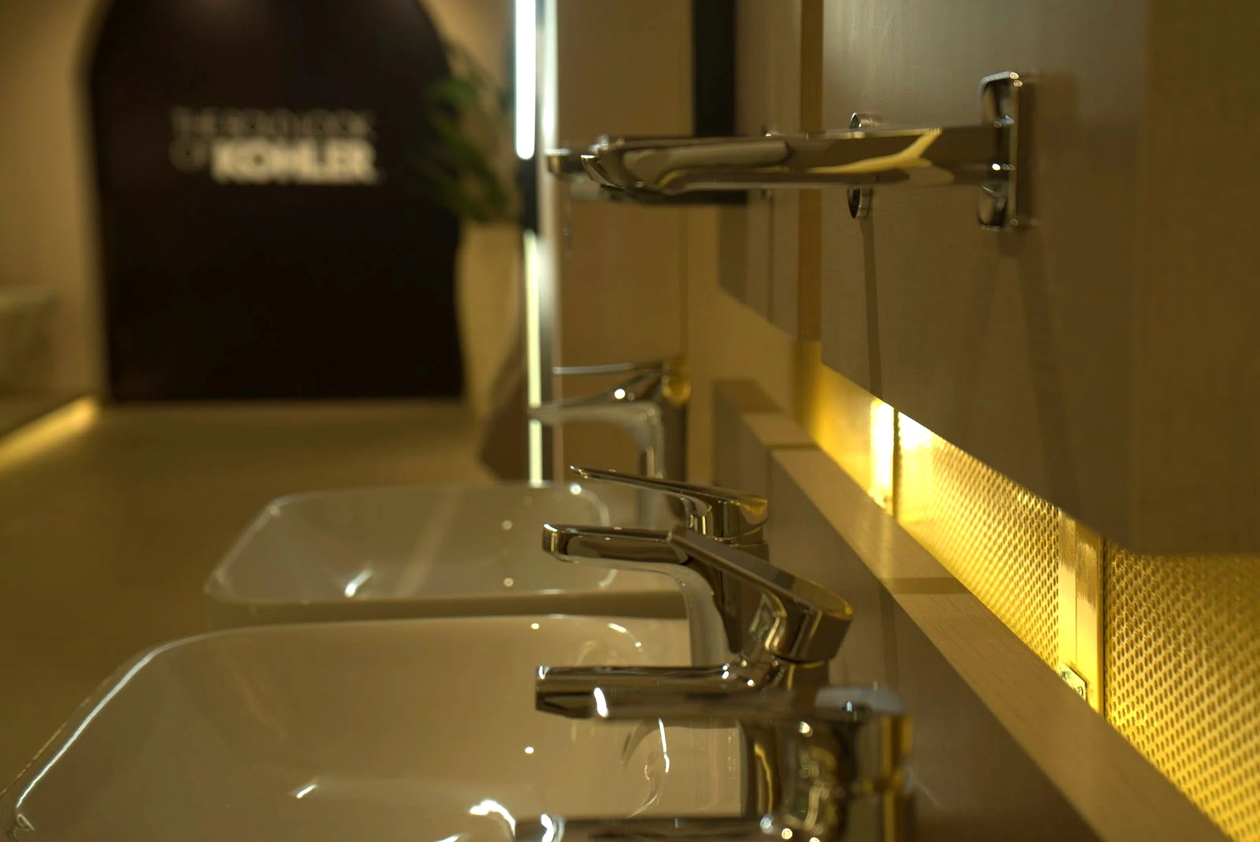 Close view of a wall mounted basin mixer