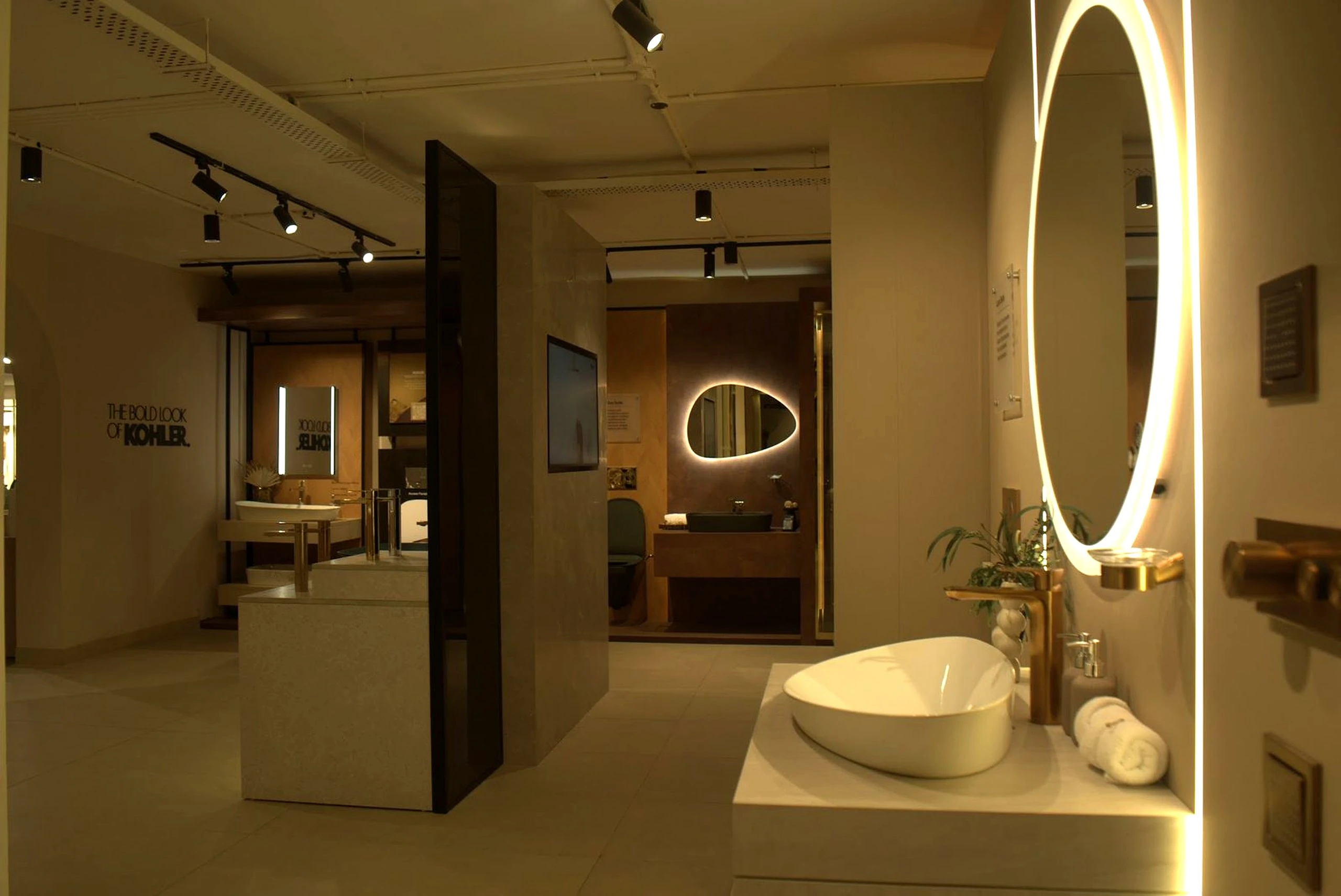 Evening view down the showroom towards the vanity displays