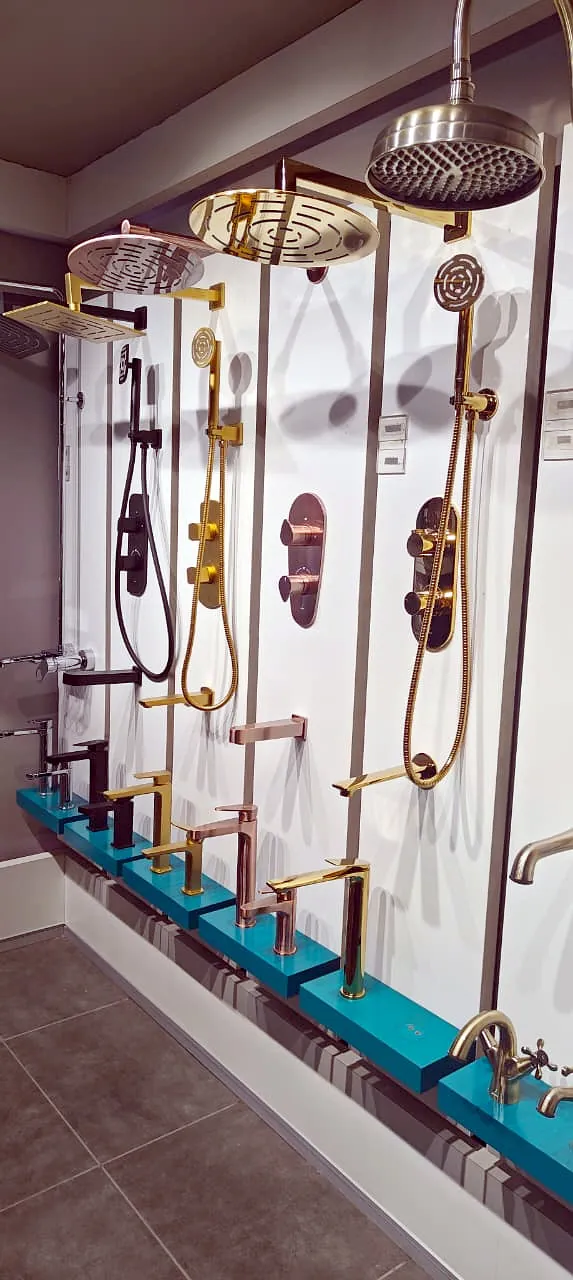Overhead rain showers in brass and gold finishes