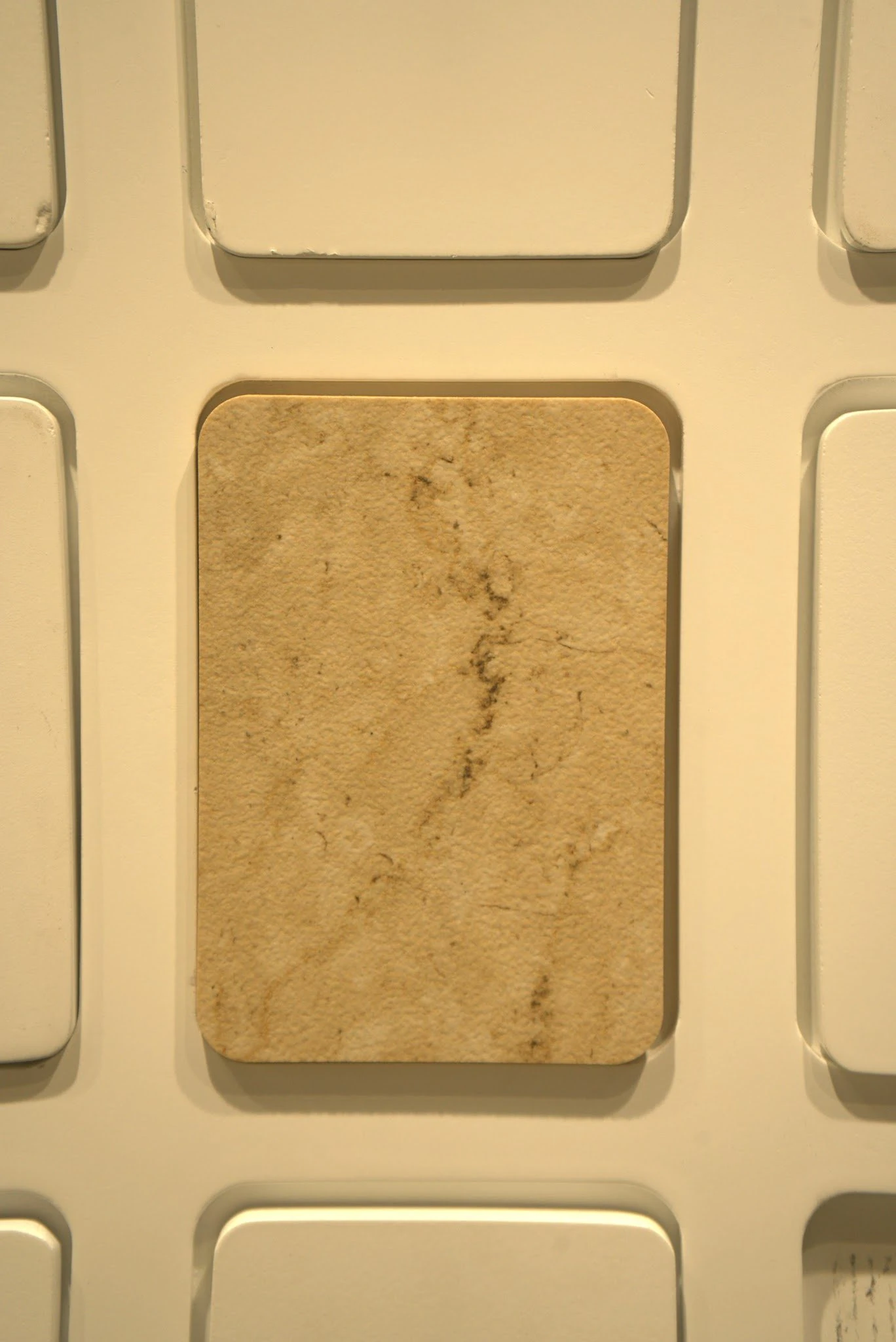 Macro view of a structured surface with deep relief and shadow